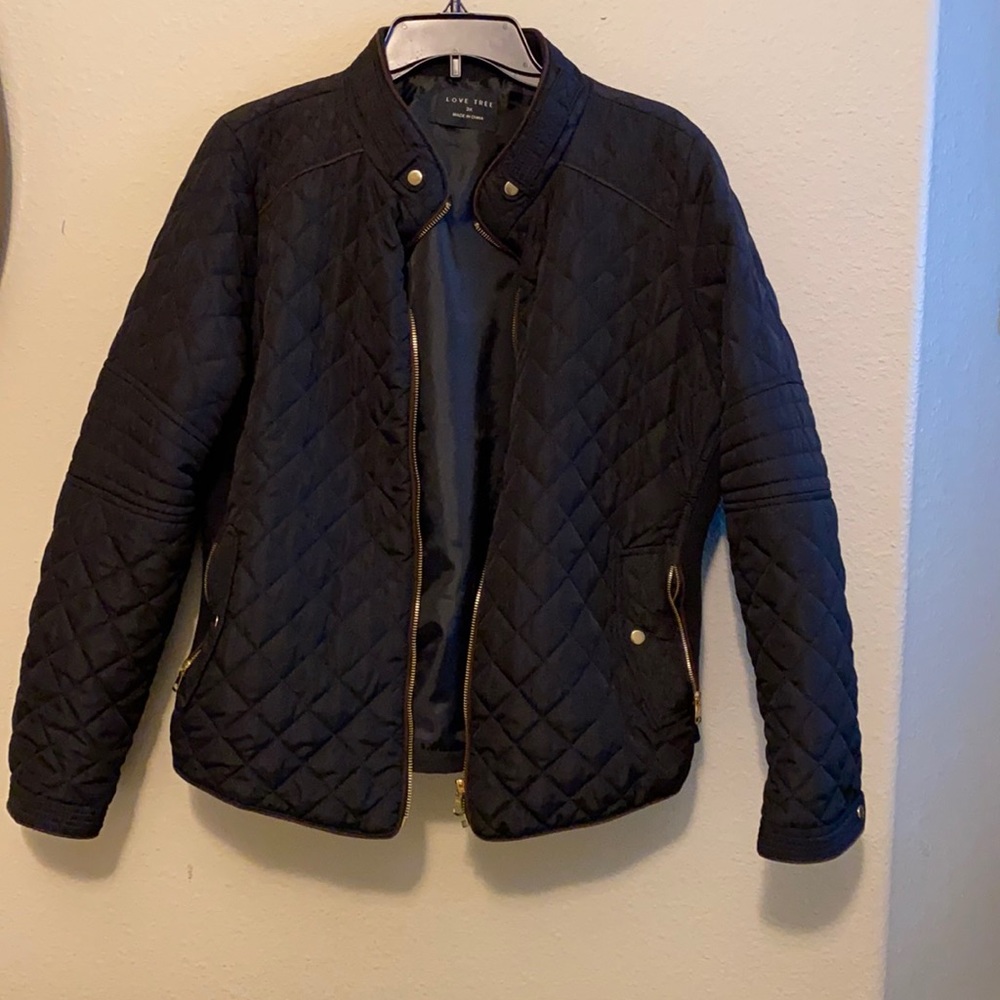 Black jacket worn no more than 5 times